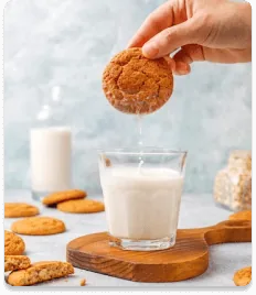 A glass of Khalis milk with cookies